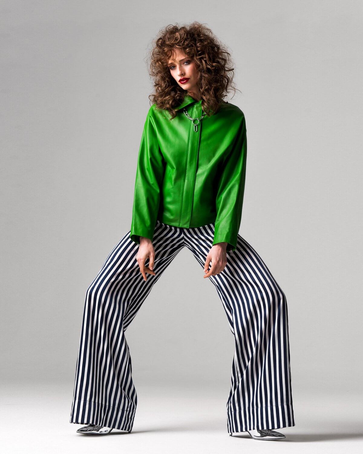 Model posing during a fashion shoot by Jay Mawson at fivefourstudios.